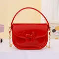 Borsa a tracolla in jelly rosso lucido per bambine con catena dorata e manico - Rosso