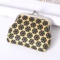 Retro mini kiss-lock coin purse featuring black geometric circular patterns for women - Geometric Circular Pattern / Yellow