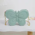 Simpatica borsa a tracolla a farfalla per bambine in verde chiaro con catena d'oro. - Verde
