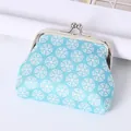 Vintage light blue kiss-lock coin purse with white geometric floral pattern detail - Geometric Circular Pattern / Blue