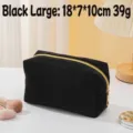 Große schwarze Kosmetiktasche aus Cord mit goldenem Reißverschluss für Reisen und Make-up - L / 18x7x10cm / Schwarz