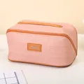 Große rosa Reise-Kosmetiktasche mit stilvoller Webstruktur und praktischem Griff - Geflochtener Stil / Rosa