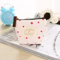 Petit porte-monnaie en toile fleurie avec fermeture éclair et étiquette lifestyle - Blanc
