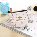 Petit porte-monnaie en toile avec imprimé floral et patch lifestyle, fermeture éclair - Bleu
