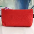 Trousse à maquillage rouge vif avec imprimé de lettres SOIGNE et fermeture éclair sûre - Rouge