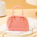 Elegant pink mini PVC jelly shell bag with pearl texture and gold crossbody chain - Mini Shell Bag / Pink