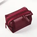 Small burgundy nylon mesh coin purse features a durable zipper and brand label detail - Mesh Square-Cinnabar Red
