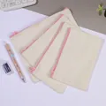 Set of four cream-colored canvas zipper pouches with pink zippers for DIY and storage - Pink