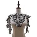 Detailed view of two-tone floral water-soluble lace patch embroidery on mannequin form - Black and White Style (LG293)