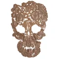 Detailed view of a brown hollow-out lace skull embroidery patch with floral patterns. - Coffee