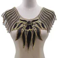 Close-up of elegant black and gold embroidered lace collar applique shown on a mannequin - Black & Gold