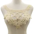 Detailed cream water-soluble lace collar embroidery displayed on a neutral mannequin - Beige