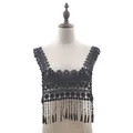 Detail view of black water-soluble lace collar with intricate embroidery and hanging tassel fringe - Black