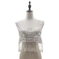 Close-up of white water-soluble lace collar with tassel fringe displayed on a mannequin. - White