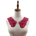 Detailed view of magenta 3D water-soluble lace floral collar on a mannequin bust - Fuschia