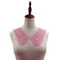 Detailed close-up of pink water-soluble milk silk lace collar displayed on mannequin - Dusty Pink