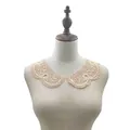 Close-up detail of a cream water-soluble lace detachable collar displayed on a mannequin - 1 Pair Set / Beige
