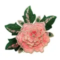 Close-up showing the intricate texture of pink embroidered rose patch with gold edging - Pink Rose