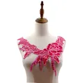 Detailed view of pink water-soluble embroidered floral collar appliqué on a mannequin - Rose Red