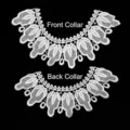 Detailed view of white water-soluble lace collar flowers with intricate embroidery - Front Collar