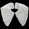 Detailed view of white cotton embroidered faux collar with floral eyelet pattern - White