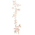 Detailed view of champagne floral lace embroidery applique for DIY wedding dress accessories. - Blush