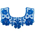 Macro detail view of intricate blue floral lace embroidery collar with hollow-out pattern - Blue