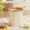 Cream-colored large capacity trash can with orange rim and vertical stripes - Large 19L / Cream
