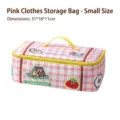 Small pink checkered cartoon clothes organizer bag with yellow handle, 31x18x11cm - Small Clothes Storage Bag / 31x18x11cm / Pink