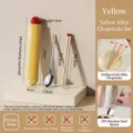 Portable yellow cutlery set with stainless steel spoon, alloy chopsticks, and storage case - Three-Piece Set / Yellow