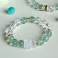 Green fluorite and clear crystal beaded bracelet with a carved Pixiu charm - Green Fluorite White Ase Pi Xiu Style