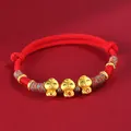 Handmade red braided string bracelet featuring three cute gold lucky snake charms for 2025 - Three Lucky Snakes Red Cord