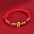 Handcrafted red braided rope bracelet with a gold snake charm for the Year of the Snake - Lucky Snake Coin Red Cord