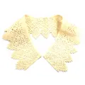 Detailed view of a hollowed-out water-soluble lace doll collar accessory for women. - Beige