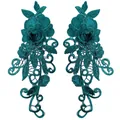 Detailed macro view of symmetrical teal 3D floral water-soluble lace patches for DIY sewing - Dark Green