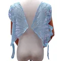 Macro view of blue butterfly lace embroidery applique for swimwear and dress back decor - Sky Blue