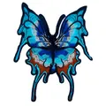 Close-up detail of a blue butterfly lace embroidery patch with intricate stitching - Cyan