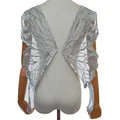 Macro view of silver butterfly wing lace embroidery applique on a mannequin - Gray
