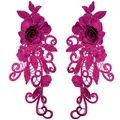 Detailed pair of 3D magenta lace floral appliques with intricate hollow embroidery pattern. - Deep purple