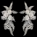 Detailed macro view of white 3D floral lace appliques with intricate embroidery patterns - Rose Pattern (LH008) / White