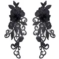 Detail of black 3D embroidered lace floral patches with intricate rose design. - Black