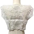 Detailed view of white water-soluble lace faux collar with elegant heart embroidery - Back Collar