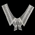 Detailed macro view of white water-soluble lace collar with intricate floral patterns - Style 2 / White