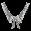 Detailed macro view of white water-soluble lace collar with delicate floral embroidery - Style 3 / White