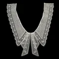 Detailed view of white milk silk lace collar with elegant bow embroidery pattern - Style 4 / White