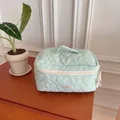 Mint green quilted cosmetic bag with heart pattern, portable travel makeup storage pouch. - Green