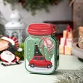 Festive green jar-shaped tin candy box featuring a red car and Christmas tree design - Christmas Car Style (Style B)