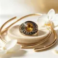 Vintage gold stainless steel military style ring featuring a large faceted yellow gemstone - Gold Yellow Zirconia