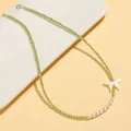 Elegant green crystal necklace featuring freshwater pearls and a delicate butterfly charm. - Olivine Freshwater Pearl Shell Butterfly Necklace