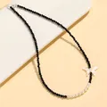 Elegant black crystal necklace with freshwater pearls and a white butterfly pendant - Black Pointy Crystal Freshwater Pearl Shell Butterfly Necklace